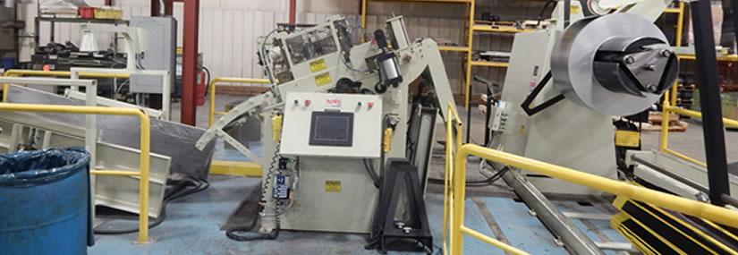 Precision Coil Straightener manufactured by ROWE© Machinery & Manufacting.